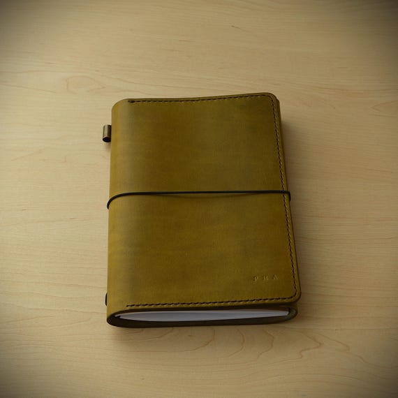 Handcrafted leather trifold journal with stitched inside pockets/perfect for jotting down memories or sketches/The ideal gift