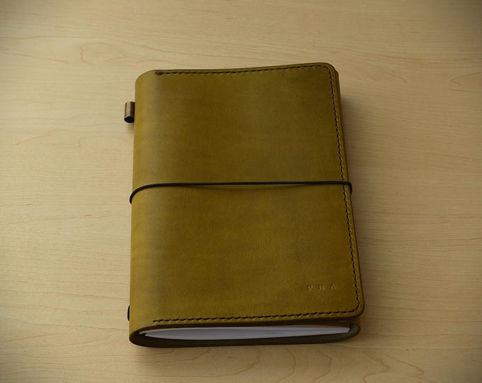 Handcrafted leather trifold journal with stitched inside pockets/perfect for jotting down memories or sketches/The ideal gift