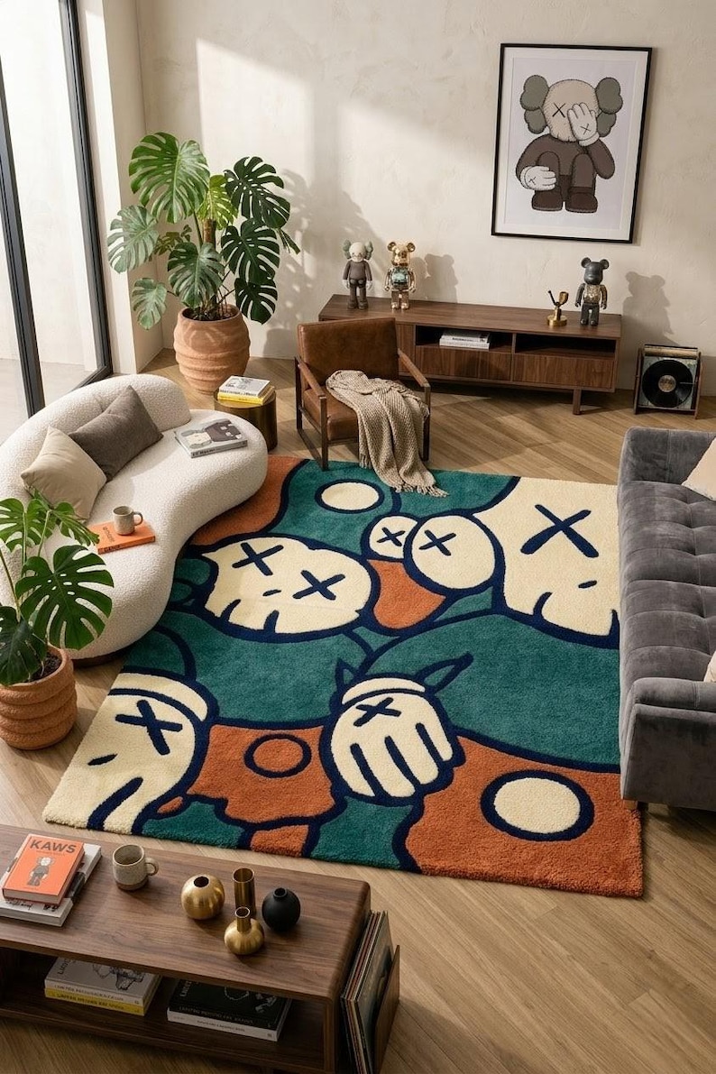 Abstract hand tufted KAWS inspired rug with bold cartoon faces in green, cream, orange and navy tones, luxury modern plush area rug for living room bedroom decor