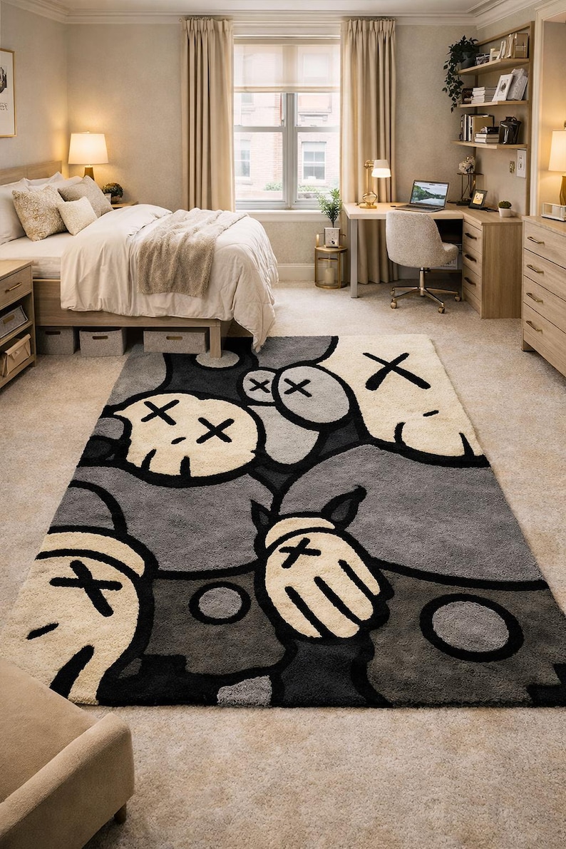 Hand tufted monochrome abstract cartoon style rug with bold black outlines and plush wool texture placed in a modern luxury living room setting.