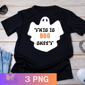 May include: Black t-shirt with a white ghost graphic and the text "This is Boo Sheet" in orange and black lettering.