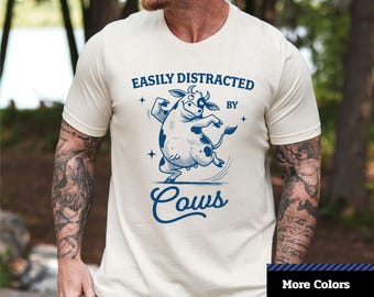 Easily Distracted By Cows T-Shirt: Unisex Farm Animal Graphic Tee