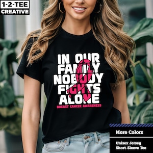 In our Family Nobody Fights Alone T-Shirt, Breast Cancer Awareness, Pink Ribbon, Fight Cancer, Fight Together, Man Women Breast Cancer.