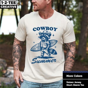 Funny Raccoon Cowboy T-Shirt: Retro Summer Graphic Tee