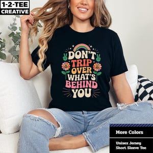 Don&#39;t Trip Over What&#39;s Behind You T-Shirt, Inspirational Graphic Shirt, Positive Quote T-Shirt, Motivational Apparel, Self-Care Fashion.