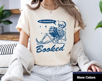 My Weekend is Booked Skeleton T-Shirt: Book Lover Graphic Tee