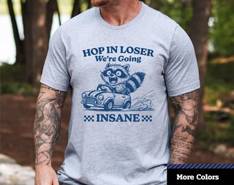 Funny Raccoon T-Shirt: Hop In Loser, Playful Car Graphic