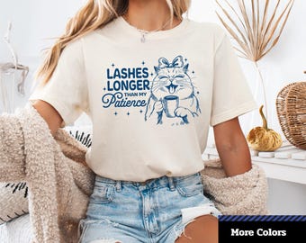 Lashes Longer Than My Patience T-Shirt, Cute Cat Humor Tee, Gift for Cat Lovers, Trendy Cat Outfit, Unisex Graphic T-Shirt.