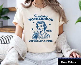 Camiseta divertida de mamá con café: Sobreviviendo a la maternidad - Camiseta gráfica unisex
