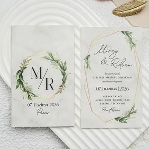 Marble Patterned White Modern Wedding Invitation Card with Gold Foiled Geometric Frame and White Sleeve with Green Leaves Monogram