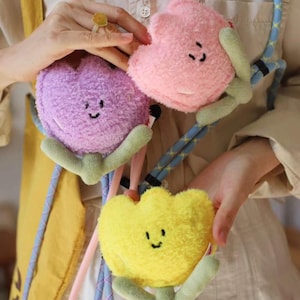 デイリーホワイト | イヤホンやアクセサリーが入る、かわいいぬいぐるみチューリップミニバッグ