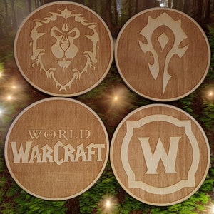 May include: Four wooden coasters featuring World of Warcraft logos. The coasters are round and have a light brown wood finish. The logos are in black and white and include the World of Warcraft logo, the Horde logo, the Alliance logo, and the World of Warcraft logo with the letter W.