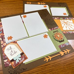 May include: A scrapbook layout with a brown, green, and orange color scheme. The layout features four white photo spaces, a decorative paper with a floral pattern, and a tag with the text "Full of thanks".