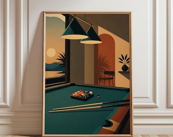 May include: A framed wall art print depicting a pool table with a rack of colourful billiard balls and two cues resting on the green felt surface. Above, two dark green pendant lights hang in a room with a view of a sunset over water.