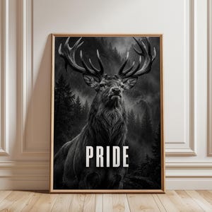 May include: A black and white framed wall art print featuring a majestic stag with large antlers standing in a dense, misty forest. The word PRIDE is printed in bold, white, sans-serif capital letters at the bottom centre of the composition.