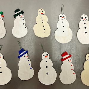 Wooden hand-painted snowmen ornaments