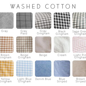 May include: A collection of fabric swatches in various colors and patterns. The swatches include solid colors like gray, beige, and cream, as well as gingham and striped patterns in colors such as black, yellow, and blue. The text "WASHED COTTON" is at the top.