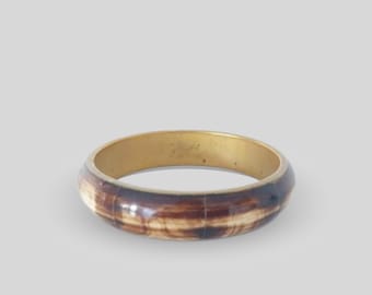Brazalete vintage de latón y hueso de los años 70, estilo bohemio étnico.