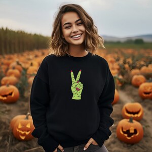 Halloween Peace Sign Sweatshirt - Retro Halloween Pullover - Monster Hand Crewneck - Fall Spooky Season Sweater - Oversized Sweater