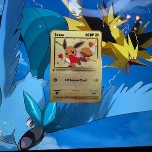 I Choose You – Eevee in Love: Eevee - Gold Metal Card. A special gift, perfect for a unique and unforgettable thought.