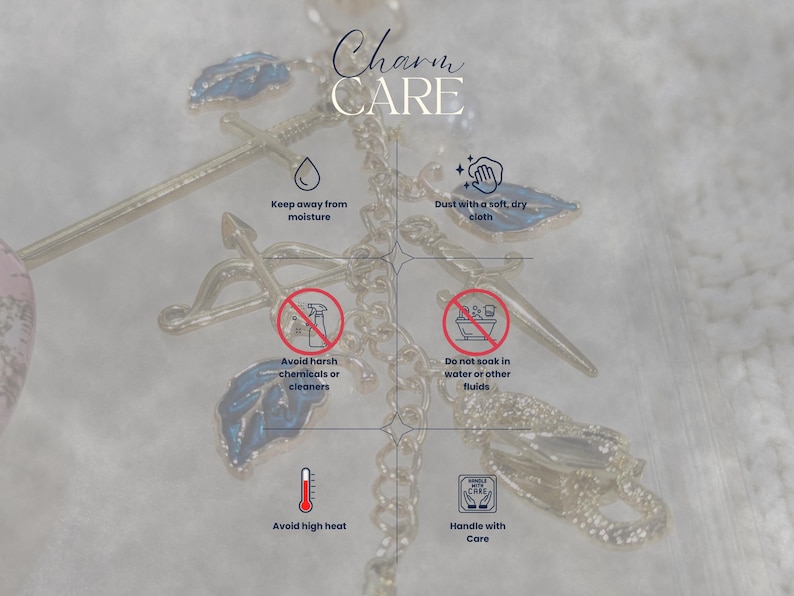 May include: A close-up of a silver-colored charm with blue leaf accents and a chain. The image includes text that reads "Charm CARE" and instructions: "Keep away from moisture," "Dust with a soft, dry cloth," and "Avoid harsh chemicals or cleaners."