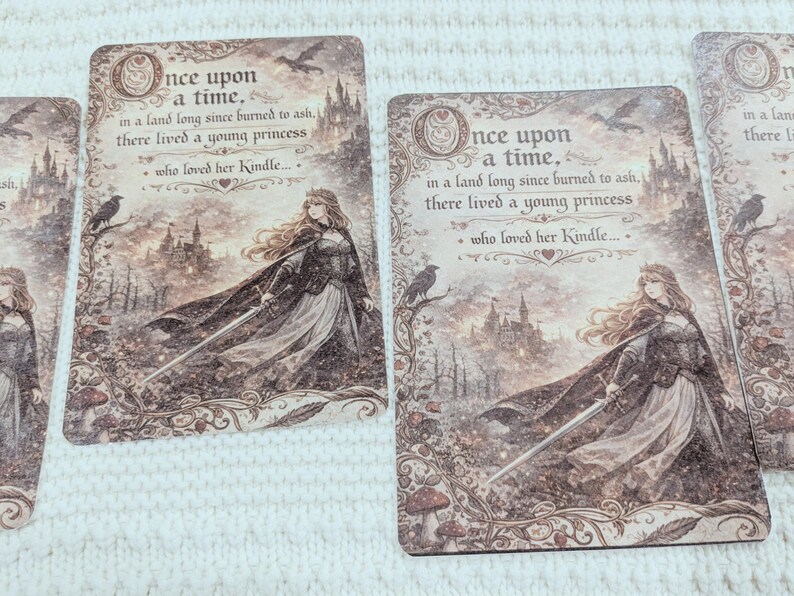 May include: Cards with a fantasy illustration of a princess holding a sword, a castle, and the text "Once upon a time." The cards have a vintage, sepia-toned aesthetic with decorative borders.