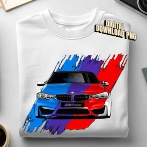 May include: A white crew neck t-shirt featuring a graphic of a sports car in front of a blue, purple, and red brushstroke design. The car grille displays the text M Power. The upper right corner contains the text DIGITAL DOWNLOAD PNG.