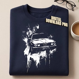 May include: A navy blue sweatshirt featuring a white graphic illustration of a classic BMW car with a paint splatter effect. The text DIGITAL DOWNLOAD PNG is printed in the upper right corner. The design is centered on the front of the garment.