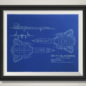 May include: A blueprint style illustration of the SR-71 Blackbird reconnaissance aircraft on a blue background. The illustration shows the aircraft in various views, including top, side, and bottom. The text "SR-71 Blackbird" is printed below the aircraft. The text also includes the aircraft's manufacturer, Lockheed, its speed, Mach 3.3, its maximum altitude, 85,000 ft, and its engine type, 2 x Pratt & Whitney J58 afterburning turbojets.