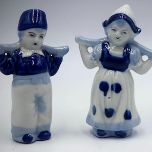 Vintage Hand Painted Dutch Boy and Girl Delft Blue Figurines.  1960&#39;s, Made in Japan, Porcelain. Marked on Bottom