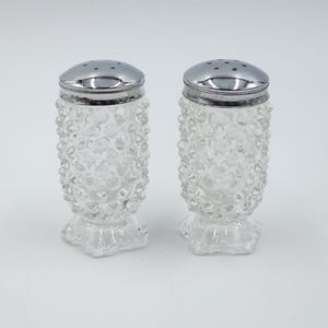 Vintage Fenton Crystal Clear Glass Hobnail Footed Salt & Pepper Shakers.  Flower Petal Foot.  USA, 1970-1990
