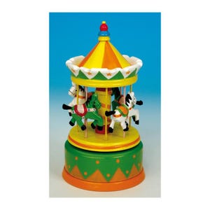 May include: A colorful carousel music box featuring a yellow and orange striped conical roof with a green scalloped edge. The base is green with orange triangular patterns and dots. Three small horses in white and green rotate around a central pole.