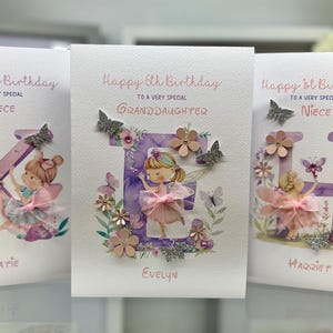 May include: Three handmade birthday cards with purple letters, glitter, and a fairy illustration. The cards say "Happy 3rd Birthday to a very special Niece Katie", "Happy 6th Birthday to a very special Granddaughter Evelyn", and "Happy 1st Birthday to a very special Niece Harriet".