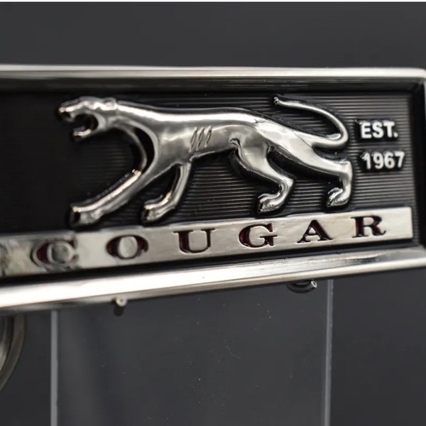 Mercury Cougar emblem keychains.