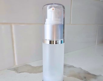 30ml Airless Pump Bottle, Reusable, Clear Cap, Matte Silver Collar, Frosted Body Width - 36.17mm  Height- 131.77mm
