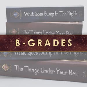 May include: A stack of four books with dark gray spines. The top two books are titled What Goes Bump In The Night and The Things Under Your Bed. The bottom two books repeat these titles. A dark red banner across the center reads B-GRADES.
