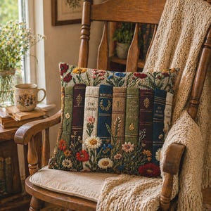 Beautifully detailed vintage book floral pillow brings together the charm of antique library shelves and wildflower meadows in one cozy accent piece. Each “book spine” features uplifting phrases like Stay Curious and Grow Through What You Go Through, making it more than décor… it’s a daily dose of inspiration stitched into comfort.