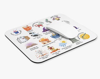 May include: A white mouse pad with a colorful design featuring various illustrations and inspirational quotes. The quotes include "Create your own magic", "Seek out comfort", "Trust your instincts", "Indulge in knowledge", "Continue growing", "Don't dim your light", "Accept Life's changes", "Harvest new ideas", "Allow feelings to come & go", "Remove negativity", "Believe in miracles", "Make plans", "Face your fear", "Look up at the moon", and "Delighted with laughter".