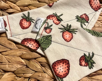 Beige bandana with cute strawberries over the collar design.