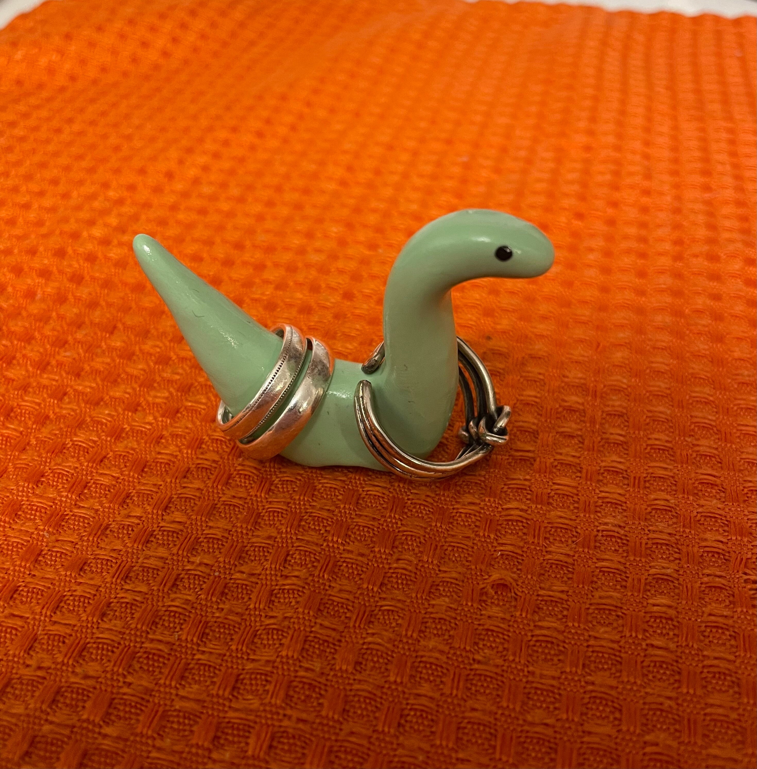 Dinosaur ring holder deals