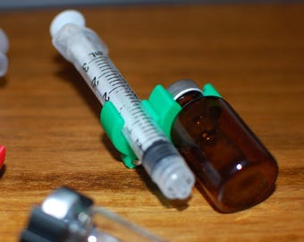 3 mL Syringe & Vial Universal Snap Holder Keychain. Great for critical care, EMS, paramedics, nurses, hospital, healthcare, meds, and more