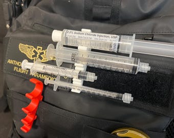 10, 10, 3, & 1 mL Syringe Snap Holder for flushes, meds, etc. Great for critical care, nurses, paramedics, RN. Keychain, MOLLE compatible.