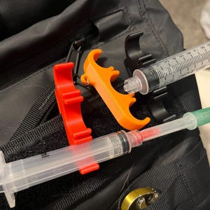 5 & 10 mL Syringe Snap Holder for flushes, medications. Great for critical care, nurses, paramedics, RN, ICU. Keychain, MOLLE compatible.