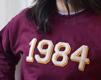 crewneck sweatshirt with custom wool felt lettering