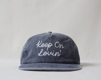 washed cotton field trip hat with custom wool-thread embroidery