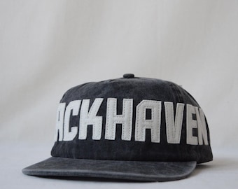 washed cotton field trip hat with custom oversized wool felt lettering