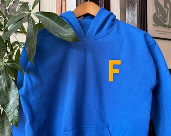 custom hand-cut thick wool felt initial on youth crewneck or hooded sweatshirt