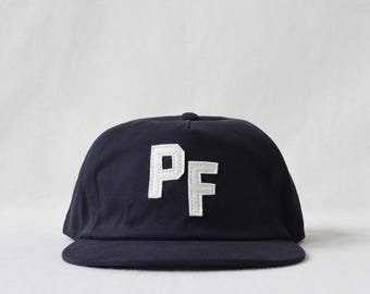 brushed cotton snapback hat with custom wool felt lettering