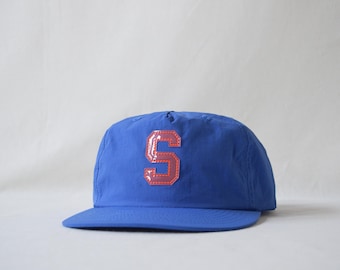 surf cap with custom acrylic letter