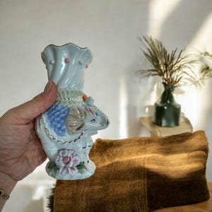 Vintage Porcelain Elephant Bud Vase: Blue, White, and Pink Rose Accent